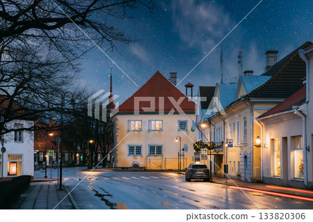 Kuressaare, Estonia. Building Of Noble Assembly And Kuressaare Town Hall At Lossi Street In Evening Or Night Illuminations Kuressaare, Estonia. Building Of Noble Assembly And Kuressaare Town Hall At Lossi Street In Evening Or Night Illuminations 133820306