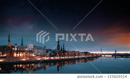 Riga, Latvia, Europe. Cityscape In Morning Time. Night View Of Castle, Dome Cathedral And St. Peter's Church. Popular Place With Famous Landmarks. UNESCO. Old Town In Street Christmas Decoration 133820314