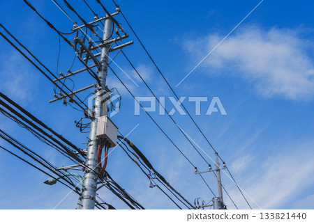 Blue sky and electric poles 133821440