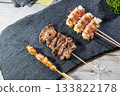 grilled pork shish kebab with spices and parsley 133822178