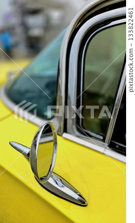 Mirror of a yellow classic car Mirror of a yellow classic car 133822461