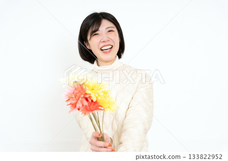 Young woman with a bouquet Young woman with a bouquet 133822952