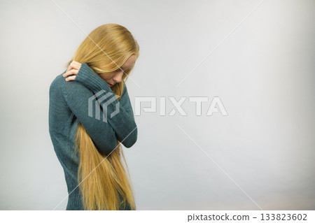 Sad unhappy young female Sad unhappy young female 133823602
