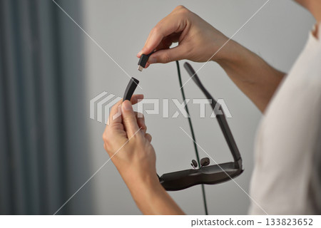 Connecting USB-C cable to smart AR glasses Connecting USB-C cable to smart AR glasses 133823652