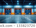 large warehouse space with doors for truck entry 133823720