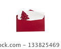 Red envelope with white card and Christmas tree decoration, open, isolated on white background, festive and elegant 133825469