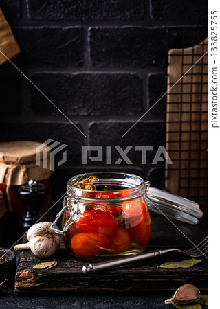 Marinated pickled tomatoes in jar Marinated pickled tomatoes in jar 133825755