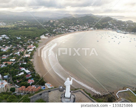 Scenic view of coastal town and beach from hilltop in Mexico Scenic view of coastal town and beach from hilltop in Mexico 133825866