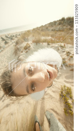 A Surreal Portrait Captured by the Shoreline Featuring Unique and Interesting Angles 133825909