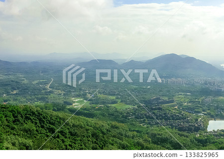 View of the beautiful jungle depths of Yanoda Park on Hainan Island, China. 133825965