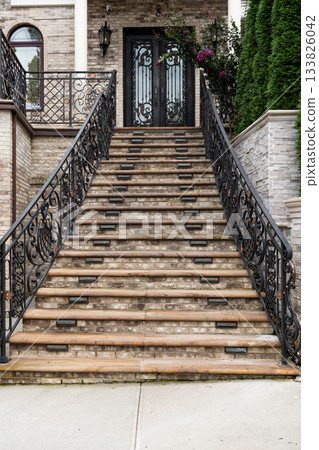 Staircase passage outdoor. Staircase in modern building. Architecture details. Stairs passage architecture. Detailed architecture. Passage with stairs Staircase passage outdoor. Staircase in modern building. Architecture details. Stairs passage architecture. Detailed architecture. Passage with stairs 133826042