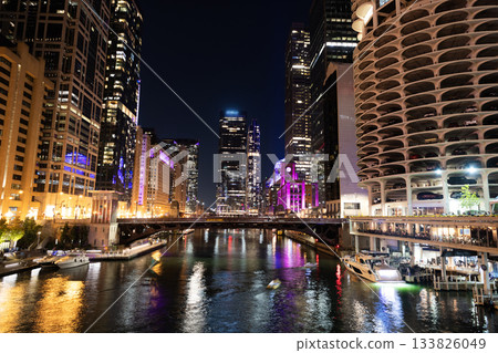 Chicago city cityscape. Cityscape night skyscraper building. Skyline architecture. Chicago city illuminated building. Night in Chicago city downtown. Skyscraper architecture. Evening in metropolis 133826049