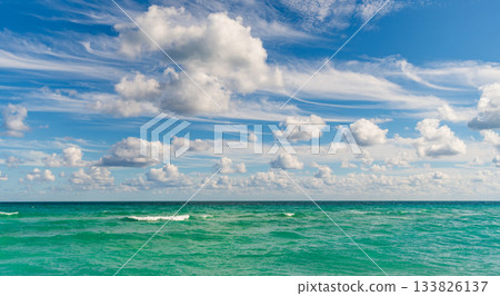 Calm horizon at sea. Romantic summer vacation seascape. Seascape horizon paradise. Sea sunrise on ocean beach. Sunset seascape at summer vacation. Horizon with sea cloudy sky. Stormy sea 133826137