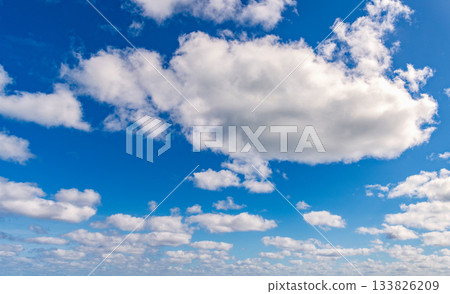 Cloudy skyscape background. Cloudscape sky background. Cloud in the sky. Background with cloud. Gloomy sky with overcast clouds. Skyscape and cloudscape. Color contrast. Sky with clouds 133826209