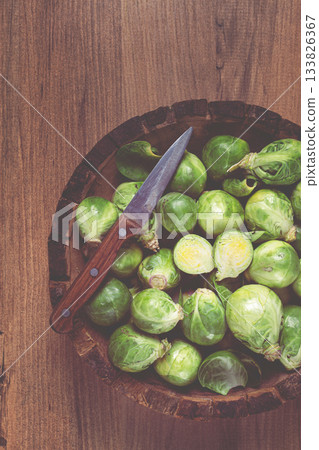 fresh Brussels sprouts, raw, top view, on a wooden table, no people, fresh Brussels sprouts, raw, top view, on a wooden table, no people, 133826367