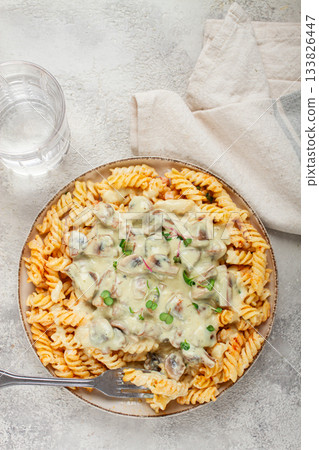 fusilli pasta, with champignons, in creamy garlic sauce, with herbs and spices, sauce, no people, 133826447
