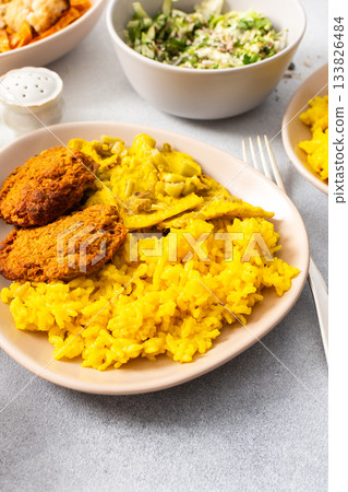 A colorful spread featuring rice with rhubarb fried eggs, baked sweet potato, and sauteed cauliflower and zucchini A colorful spread featuring rice with rhubarb fried eggs, baked sweet potato, and sauteed cauliflower and zucchini 133826484