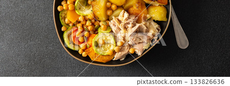 This balanced breakfast showcases baked sweet potato with carrots and zucchini, flavorful carrot and lentil cutlets, chicken breast, banner 133826636
