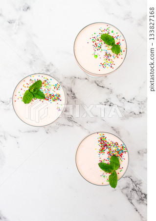 fruit mousse, made from jelly and cottage cheese, in glasses, decorated with sprinkles and mint, homemade fruit mousse, made from jelly and cottage cheese, in glasses, decorated with sprinkles and mint, homemade 133827168