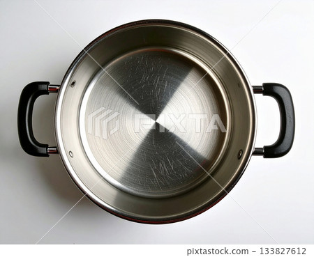 Food industry. Frying pan on white background. Cooking concept. Top view. Food industry. Frying pan on white background. Cooking concept. Top view. 133827612