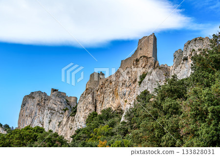 The Cathar medieval castle of Peyrepertuse in the Aude department, southern France situated in the French Pyrenees The Cathar medieval castle of Peyrepertuse in the Aude department, southern France situated in the French Pyrenees 133828031