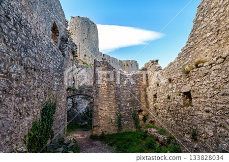 The Cathar medieval castle of Peyrepertuse in the Aude department, southern France situated in the French Pyrenees 133828034