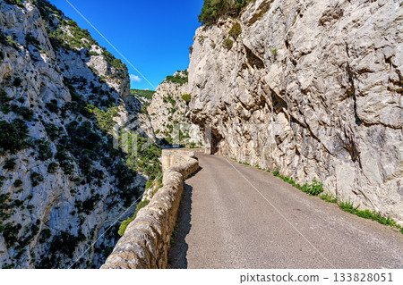Driving through the amazing Gorges de Galamus, Aude, Eastern Pyrenees, Languedoc Roussillon, France. 133828051