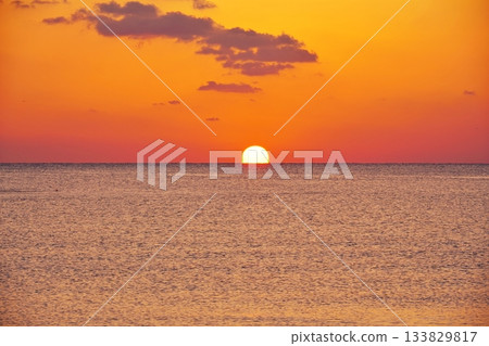 Sunset over the horizon 133829817