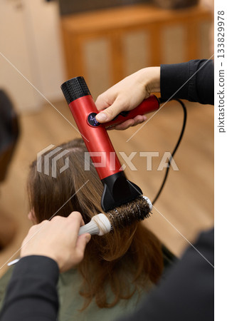 refined styling with professional tools, achieving perfect hair shape through expert techniques and tools refined styling with professional tools, achieving perfect hair shape through expert techniques and tools 133829978