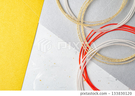 Background composition with gold and silver paper and Mizuhiki string Background composition with gold and silver paper and Mizuhiki string 133830120