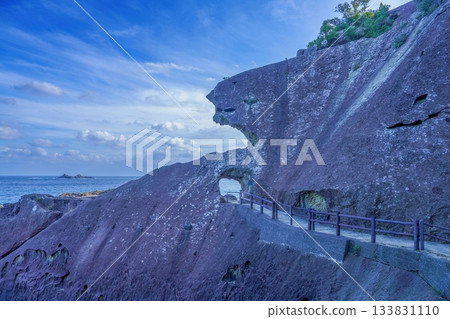 The unique rock formations of Onigajo and the Kumano Sea seen against the blue sky 133831110