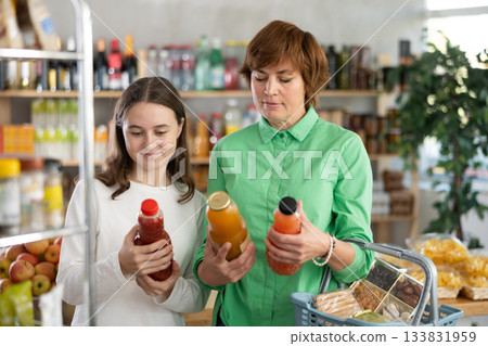 Family chooses natural juices Family chooses natural juices 133831959