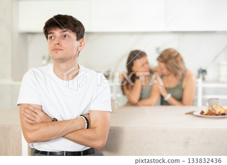 Quarrel of mom, girl and young guy. Woman and girl shouts at guy and accuses her Quarrel of mom, girl and young guy. Woman and girl shouts at guy and accuses her 133832436