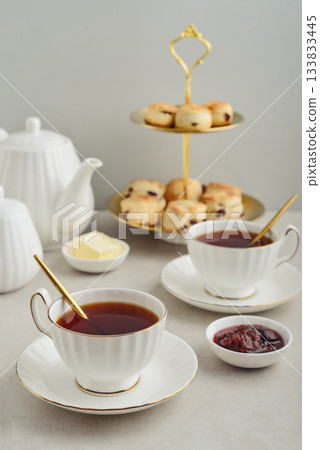 English Afternoon Tea  in elegant white porcelain cups 133833445