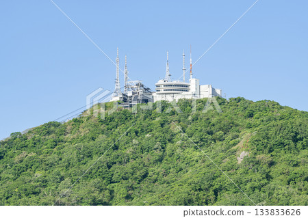 Hakodate City, Hokkaido, Mt. Hakodate summit observation deck and Mt. Hakodate ropeway summit station on a clear day 133833626