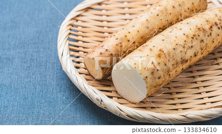 Cut yam arranged on a bamboo colander Cut yam arranged on a bamboo colander 133834610