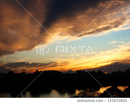 Sunset sky seen from the Arakawa River bank in Kawaguchi City Sunset sky seen from the Arakawa River bank in Kawaguchi City 133835603
