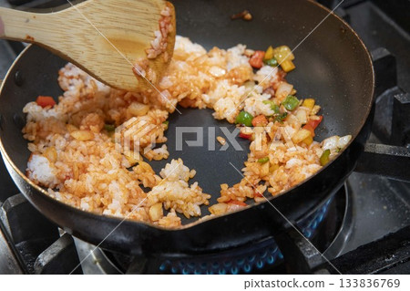Cooking chicken rice Cooking chicken rice 133836769
