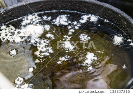 Cooking scene with deep-frying oil 133837216