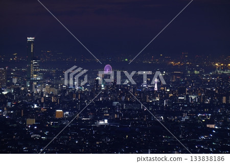 Glittering abstract city lights Night view of the Osaka plain seen from Mt. Ikoma Osaka Aquarium Kaiyukan Ferris wheel 133838186