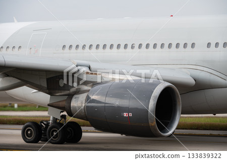 Close-up large turbofan jet engine on an airliner Close-up large turbofan jet engine on an airliner 133839322