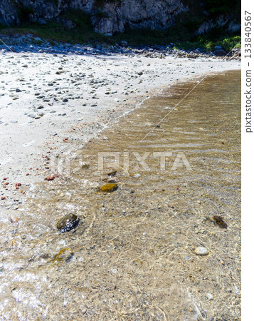 Background material: Sparkling ocean shore 133840567