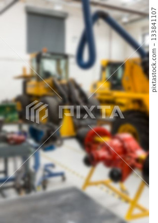 Defocused image of bulldozer Defocused image of bulldozer 133841107