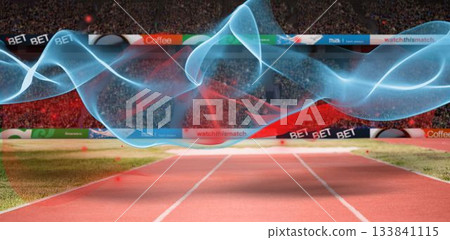 Red and blue trails over playing field Red and blue trails over playing field 133841115