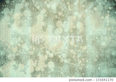 Close-up grunge design wall surface is revealing teal and beige paint with peeling areas and cracks 133841170