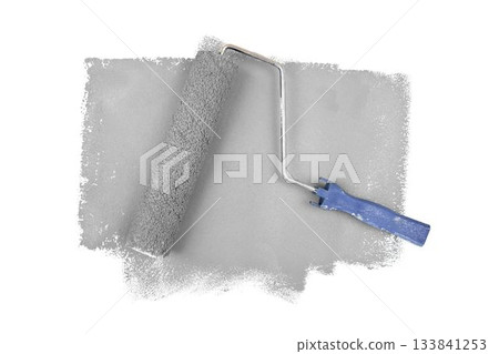 Gray paint roller over white background 133841253