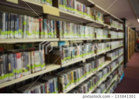 Defocused image of books in bookshelf 133841301