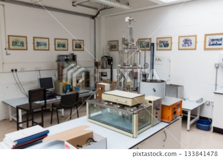 Showing flat design lab featuring vacuum chamber with transparent reservoir tank and metal column Showing flat design lab featuring vacuum chamber with transparent reservoir tank and metal column 133841478