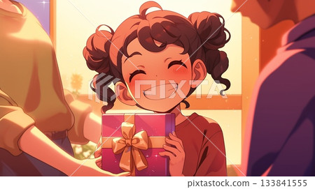 A child who is happy to receive a present 133841555