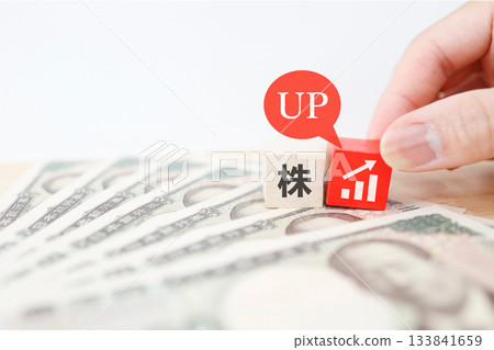 Image showing the rise in Japanese stock prices. 10,000 yen bill and graph. Image showing the rise in Japanese stock prices. 10,000 yen bill and graph. 133841659